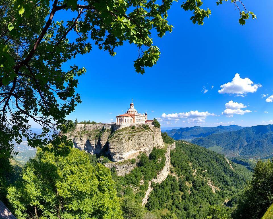 A panoramic view of Ostrog Monastery perched dramatically on a towering cliff in Montenegro, overlooking a serene valley. In the foreground, lush green trees frame the scene, while gentle sunlight filters through the leaves, casting soft shadows. In the middle, the monastery's white stone facade glistens in the bright daylight, showcasing its intricate architectural details. In the background, rolling hills stretch into the distance under a clear blue sky with a few fluffy clouds. The atmosphere is tranquil and inspirational, emphasizing the spiritual significance of the location. The image captures the essence of this stunning site, with a wide-angle perspective to highlight the monastery's grandeur and natural beauty. Use natural lighting to enhance the picturesque quality of the landscape. A panoramic view of Ostrog Monastery perched dramatically on a towering cliff in Montenegro, overlooking a serene valley. In the foreground, lush green trees frame the scene, while gentle sunlight filters through the leaves, casting soft shadows. In the middle, the monastery's white stone facade glistens in the bright daylight, showcasing its intricate architectural details. In the background, rolling hills stretch into the distance under a clear blue sky with a few fluffy clouds. The atmosphere is tranquil and inspirational, emphasizing the spiritual significance of the location. The image captures the essence of this stunning site, with a wide-angle perspective to highlight the monastery's grandeur and natural beauty. Use natural lighting to enhance the picturesque quality of the landscape.