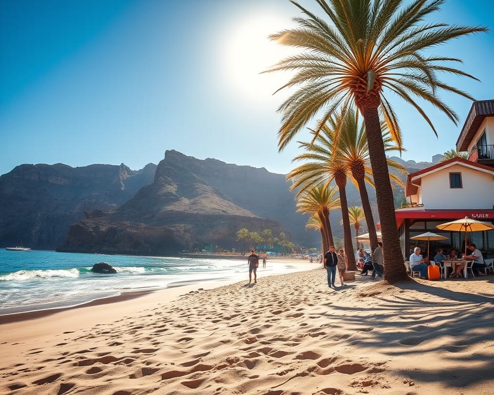 A vibrant scene depicting Gran Canaria basking in winter sunshine, showcasing the southern coast's warm climate. In the foreground, a sandy beach with gentle waves lapping at the shore. A few tourists in modest casual clothing, leisurely enjoying the sun, perhaps with a beach umbrella and a picnic setup. In the middle ground, lush palm trees sway lightly, framing a cozy beachside café with locals enjoying drinks. The background features stunning cliffs and rocky outcrops, contrasting beautifully with the azure sky. The sunlight casts a golden hue across the scene, creating a warm and inviting atmosphere. Capture this moment with soft focus, reminiscent of a wide-angle shot, emphasizing the serenity and beauty of the island in winter.